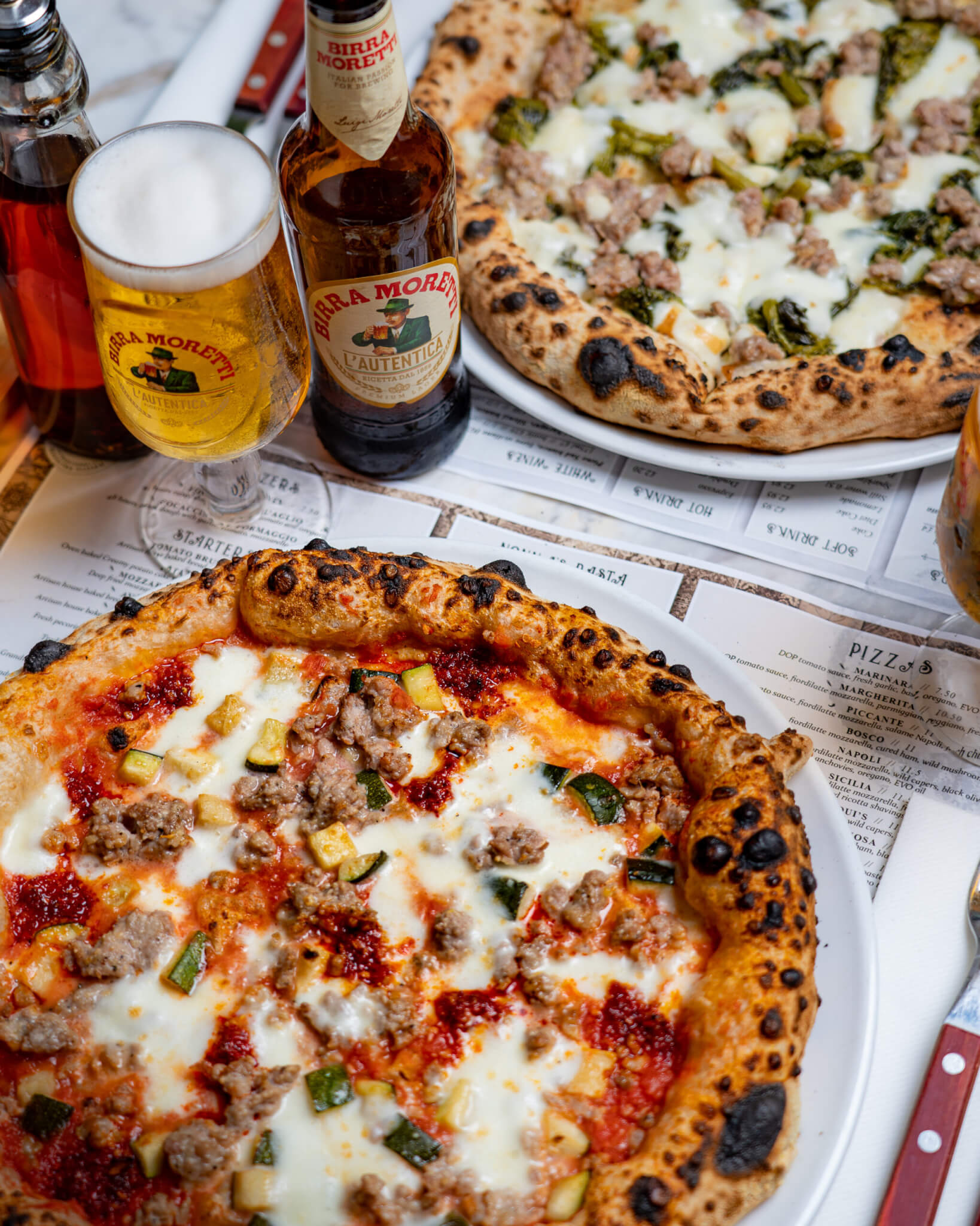 neapolitan pizza with a beer